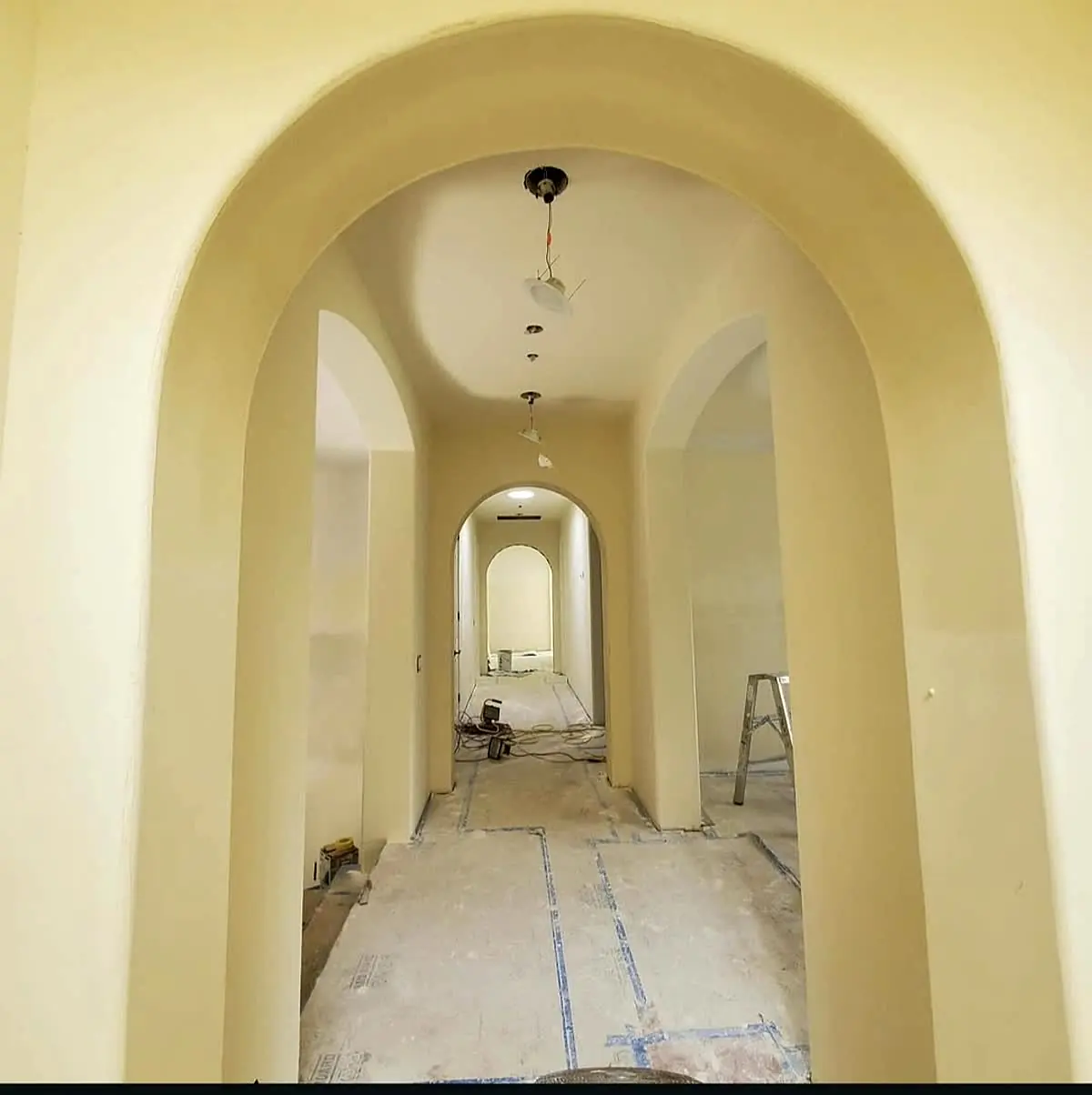 Luxury home remodel with large skylight and freshly finished drywall walls — Texture & Finish
